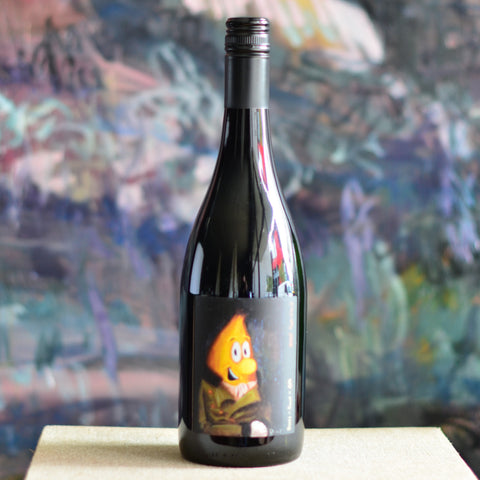 Limited edition 4ZZZ fundraiser bottle of 2023 Nero d'Avola, featuring banana in suit artwork by Dave Whitfield from 4ZZZ