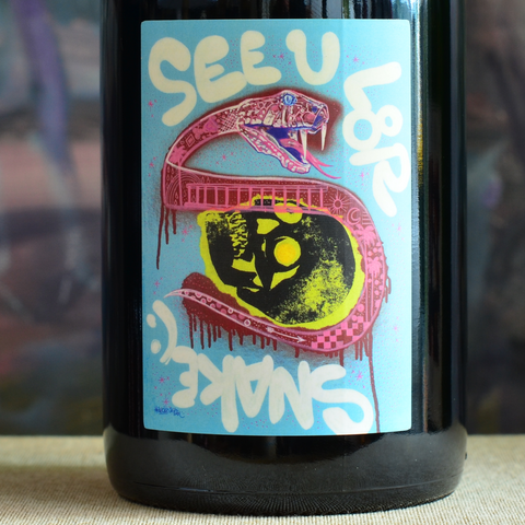 Close up of front label of Limited Edition Lucks Artwork 2023 Gerler GSM - SEE U L8R SNAKE with snake and skull. 