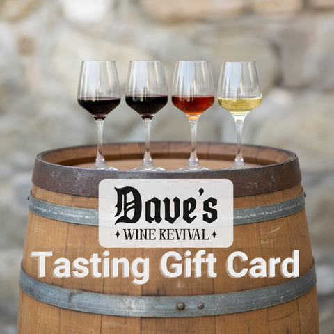 Wine tasting gift card for Dave's Wine Revival, Fortitude Valley, with wine glasses on a barrel against a blurred natural background